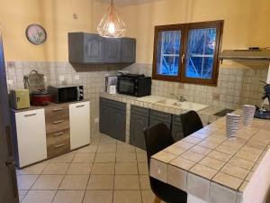 Kuchyň nebo kuchyňský kout v ubytování Villa Sea View