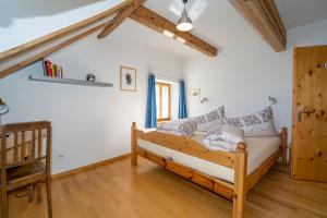 Postel nebo postele na pokoji v ubytování Apartment Bügl Grond 124