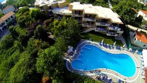 an aerial view of a resort with a swimming pool at Macedon in Limenas