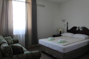 Letto o letti in una camera di Hotel Suljovic