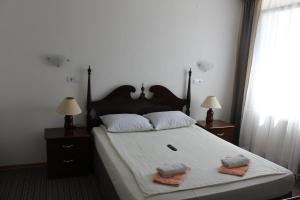 Letto o letti in una camera di Hotel Suljovic