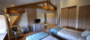 Un pat sau paturi într-o cameră la Bel Aujourd'hui Spa Sauna