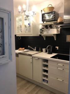 A cozinha ou kitchenette de Apartment Belle Epoque