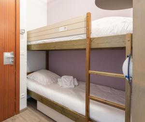 Postel nebo postele na pokoji v ubytování Résidence Pierre & Vacances La Rostagne
