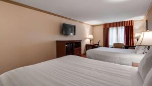 Postel nebo postele na pokoji v ubytování Best Western PLUS Morristown Inn-Florham Park