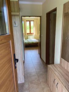 Posteľ alebo postele v izbe v ubytovaní Apartmány F - chata SVOBODĚNKA