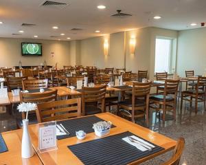 Restoranas ar kita vieta pavalgyti apgyvendinimo įstaigoje BFC Suíte em Barra da Tijuca