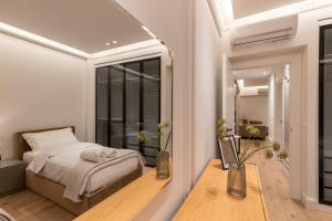 Postel nebo postele na pokoji v ubytování Night Inn Tirana