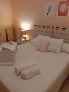 Cama ou camas em um quarto em Damiani House