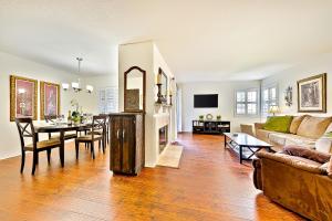 a living room with a couch and a table at Ritz Point Condo in Dana Point