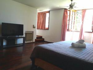 Postel nebo postele na pokoji v ubytování Tanino Guest House