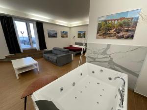 Un ou plusieurs lits dans un hébergement de l'établissement Villa Leucatia