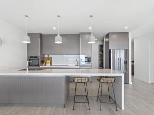 Kuchyň nebo kuchyňský kout v ubytování Maggies Place 46B Danalene Parade