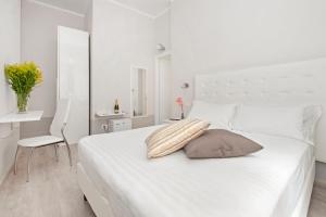 Krevet ili kreveti u jedinici u okviru objekta White Rooms Colosseo