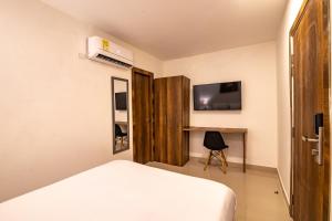 TV a/nebo společenská místnost v ubytování Hotel Amoek