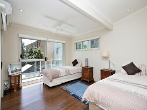 Ένα ή περισσότερα κρεβάτια σε δωμάτιο στο Florida 5 5 Lillian Street