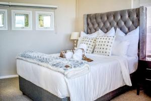 Postel nebo postele na pokoji v ubytování Palm Valley Inn - Port Elizabeth + 37 fotografií