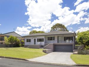 a house in a suburb with a garage at Harbour Breeze in Ulladulla