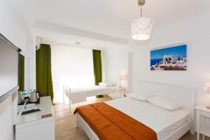 Postel nebo postele na pokoji v ubytování Ayka Hotel + 37 fotografií