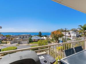 a view of the ocean from the balcony of a house at Yarramundi Unit 10 Magnus Street 47 49 in Nelson Bay