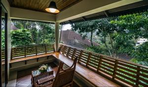 Balkón nebo terasa v ubytování Elephant Court Thekkady