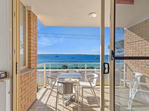 A balcony or terrace at South Pacific Unit 4 - Shoal Bay