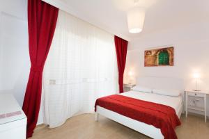Postel nebo postele na pokoji v ubytování Ayka Hotel