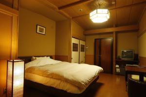 Cama o camas de una habitación en Tsuki no Shizuka