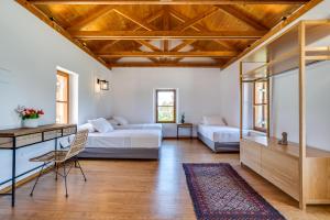 Postel nebo postele na pokoji v ubytování Armonia Retreat