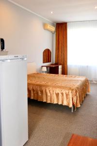 Voodi või voodid majutusasutuse Mini-Hotel Morskoi rif toas