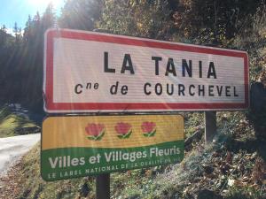 a sign that reads la tana are de gurendered at LA TANIA COURCHEVEL 73120 in Courchevel +3 photos