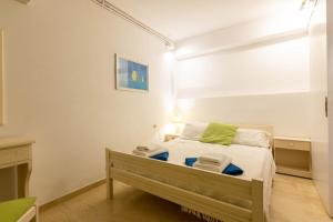 Postel nebo postele na pokoji v ubytování Lenna's Villas Zante