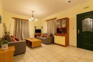 TV a/nebo společenská místnost v ubytování Lenna's Villas Zante