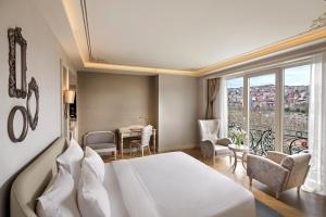 Rúm í herbergi á Lazzoni Hotel