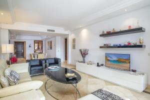 A seating area at High standard beach front apartment