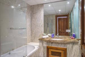 A bathroom at High standard beach front apartment
