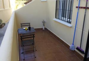 A balcony or terrace at Family friendly patio and poolview