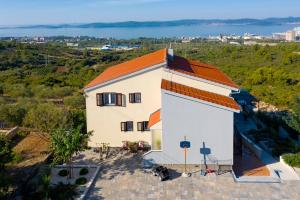 an aerial view of a white building with an orange roof at Vanda Land penthouse in Zadar