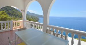 a balcony with a view of the ocean at Alconasser 10 - Amazing Seaviews between Deia & Soller in Sóller