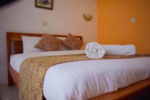 Letto o letti in una camera di Camp Mahon Gardens