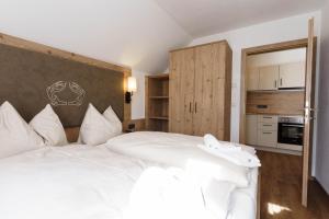 Postel nebo postele na pokoji v ubytování Stoagas Waidblick
