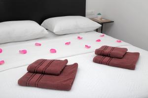 Posteľ alebo postele v izbe v ubytovaní Apartment City Gem