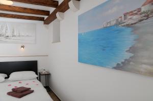 Posteľ alebo postele v izbe v ubytovaní Apartment City Gem