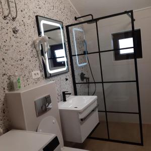 Kúpeľňa v ubytovaní Apartments Amfa