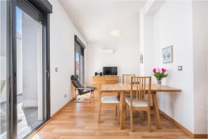 Televízia a/alebo spoločenská miestnosť v ubytovaní Jinetes Penthouse in Malaga by Solaga Holiday Homes