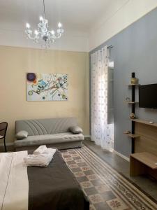 TV a/nebo společenská místnost v ubytování Mini Hotel Wf2 Caltagirone