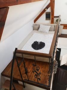 Postel nebo postele na pokoji v ubytování Dráchovský apartmán a vejminek