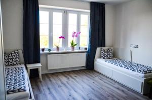 Postel nebo postele na pokoji v ubytování Apartmán u Vítka