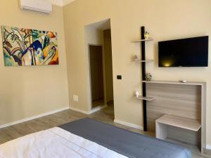 TV a/nebo společenská místnost v ubytování Mini Hotel Wf2 Caltagirone