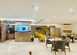 TV a/nebo společenská místnost v ubytování Ozone hotel